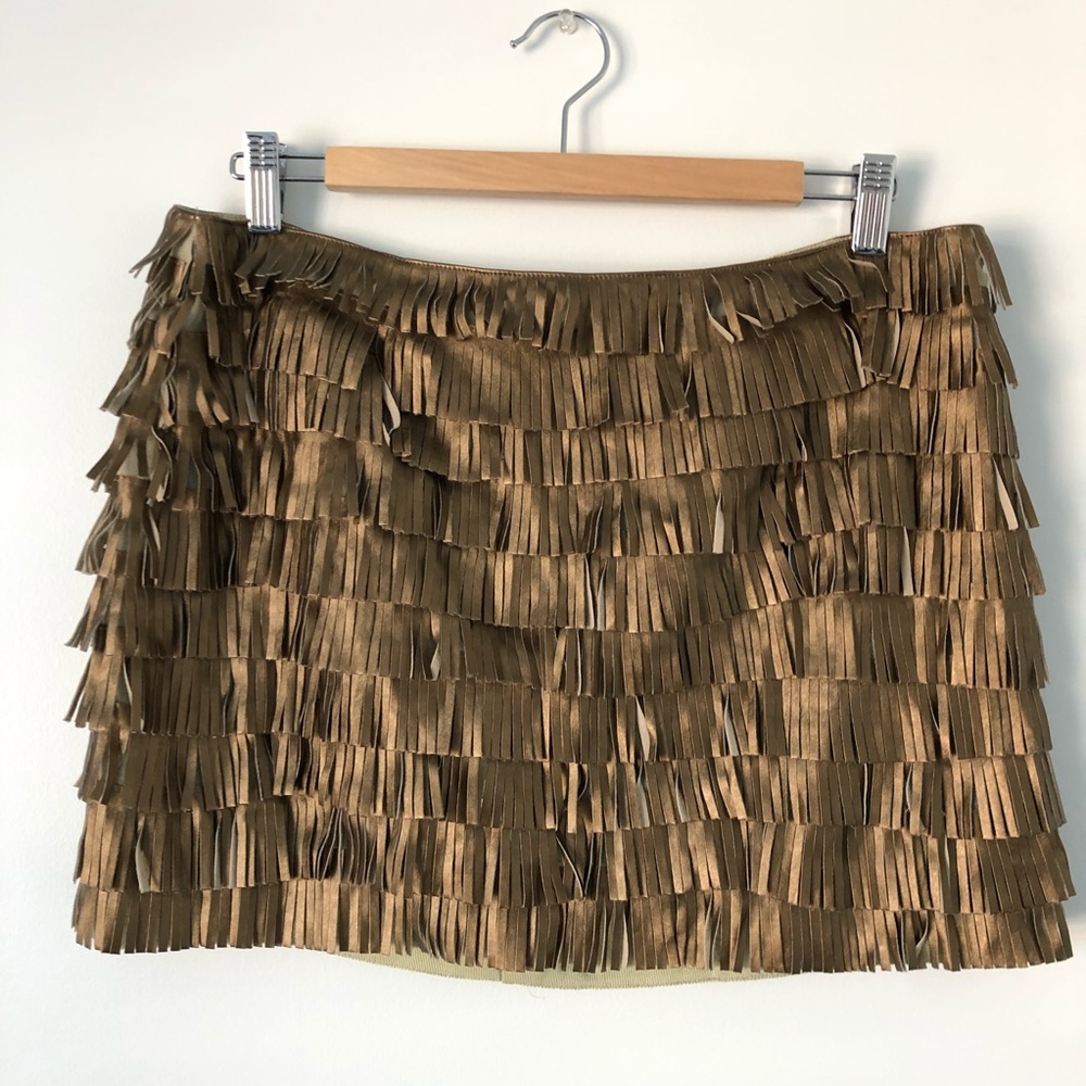 Metallic fringe skirt.